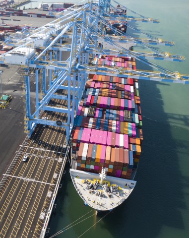 Ships and cranes at a port.